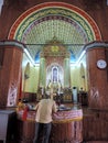 Man praying in a Church in Kerala, India